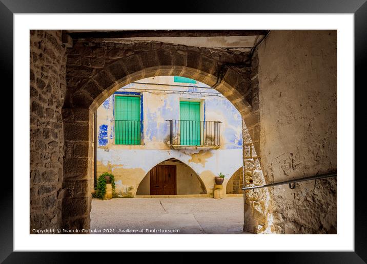 An old town with blue painted houses, on the Mediterranean coast Framed Mounted Print by Joaquin Corbalan