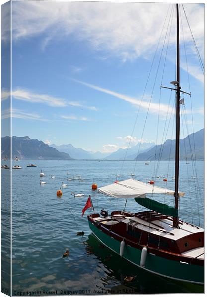 Boating on Lake Geneva Canvas Print by Russell Deaney