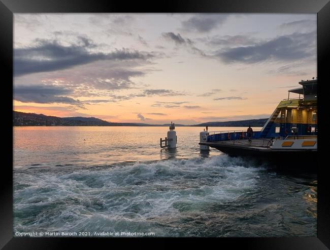 Ferry vessel leaving port at sunset Framed Print by Martin Baroch