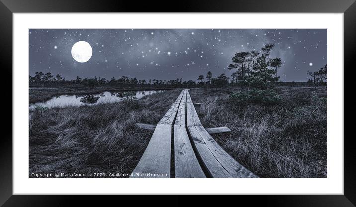Black and white photo of wooden trail across swamp Framed Mounted Print by Maria Vonotna