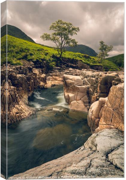 The cool clear waters of Glencoe Canvas Print by Anthony McGeever