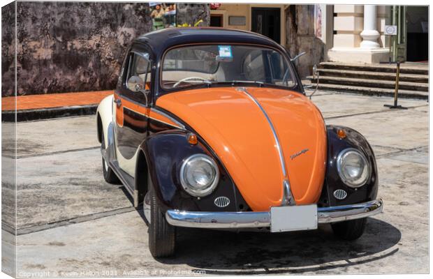 Black and orange vintage Volkswagen Beetle Canvas Print by Kevin Hellon