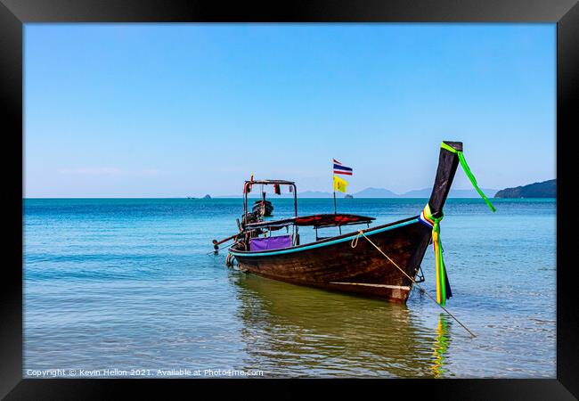Long tail boat on the Andaman Sea  Framed Print by Kevin Hellon