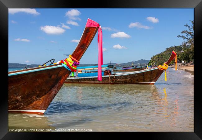 Long tail boats on the Andaman Sea  Framed Print by Kevin Hellon