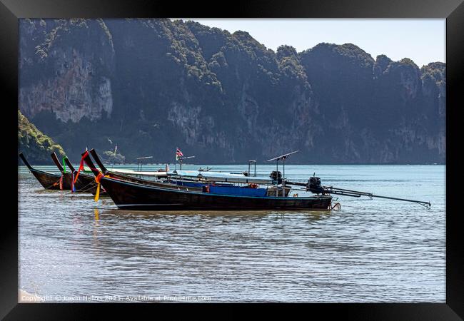 Long tail boats on the Andaman Sea  Framed Print by Kevin Hellon