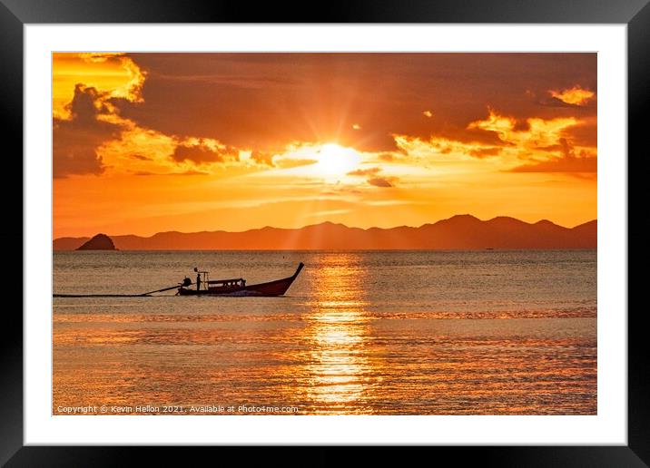 Long tail boat on the Andaman Sea at sunset  Framed Mounted Print by Kevin Hellon