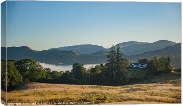 Misty sunrise in the Lake District Canvas Print by Richard Perks