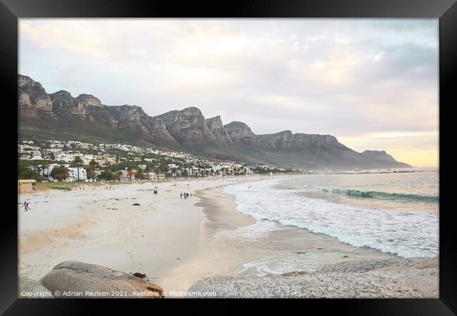 Sunset over Camps Bay beach  Framed Print by Adrian Paulsen
