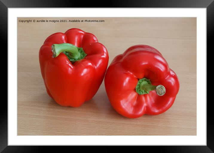 Two red peppers Framed Mounted Print by aurélie le moigne