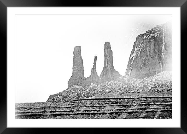 Amazing rock sculptures at Monument Valley Framed Mounted Print by Erik Lattwein