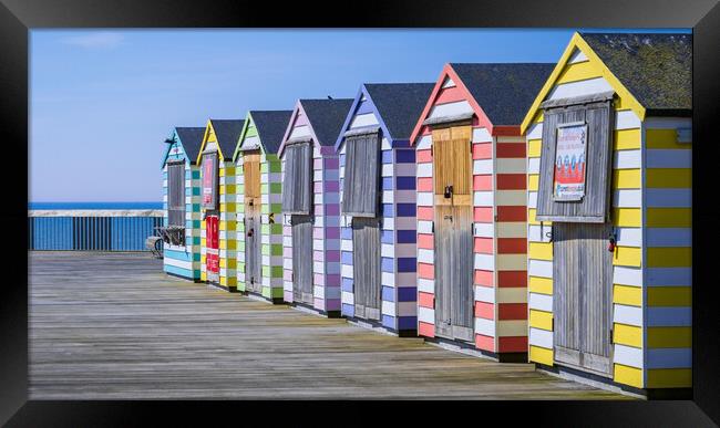 Beach Huts on Hastings pier. Framed Print by Bill Allsopp