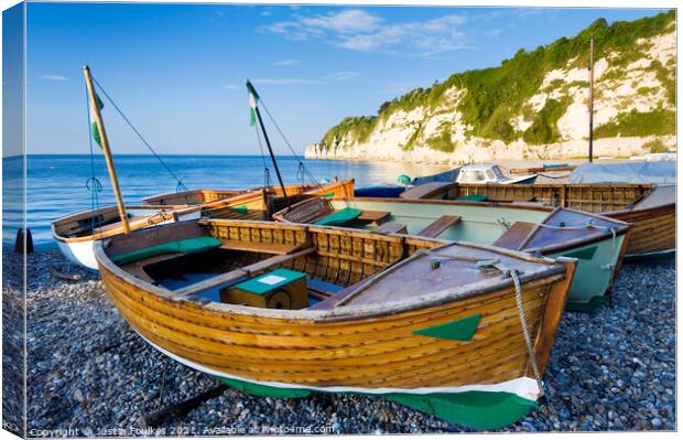 Fishing boats on the beach at Beer, East Devon Canvas Print by Justin Foulkes