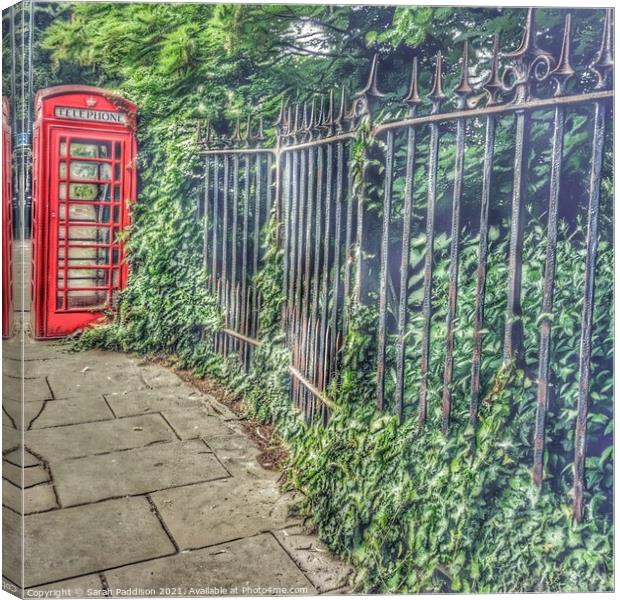 Phone box and Fence Canvas Print by Sarah Paddison