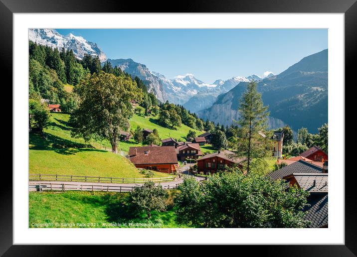 Swiss Wengen village and alps mountain Framed Mounted Print by Sanga Park