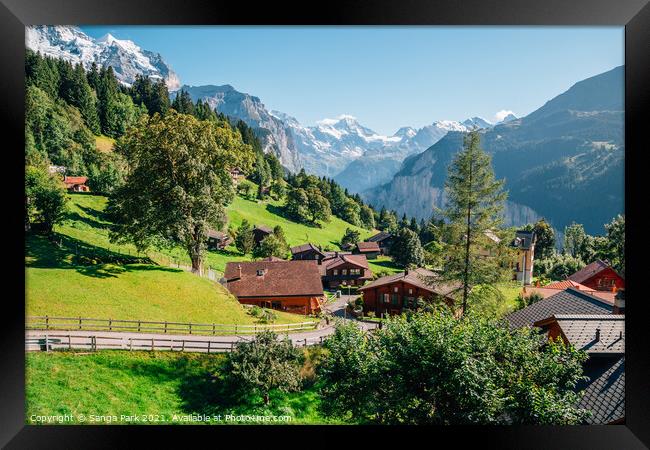 Swiss Wengen village and alps mountain Framed Print by Sanga Park