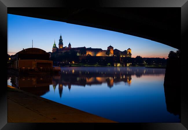 Under the Bridge River View of Wawel Castle in Krakow Framed Print by Artur Bogacki