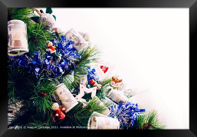 Detail of christmas tree with decorations and dollar bills wishi Framed Print by Joaquin Corbalan