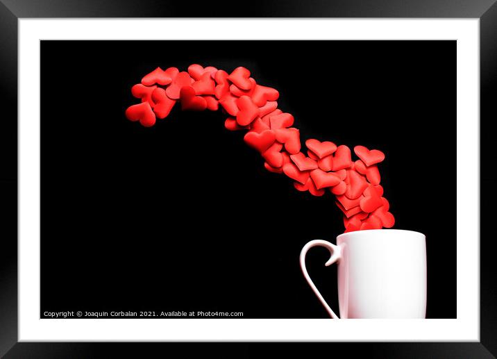 White mug with spilled loving hearts, isolated on black backgrou Framed Mounted Print by Joaquin Corbalan