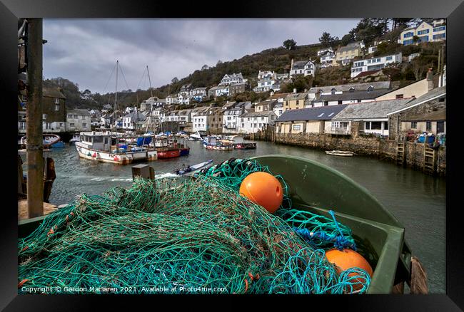 Fishing gear and boats in Polperro Harbour Cornwal Framed Print by Gordon Maclaren