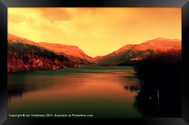 Sunrise on the Lake Framed Print by Ian Tomkinson