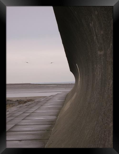 Burnham along the sea wall. Framed Print by Heather Goodwin