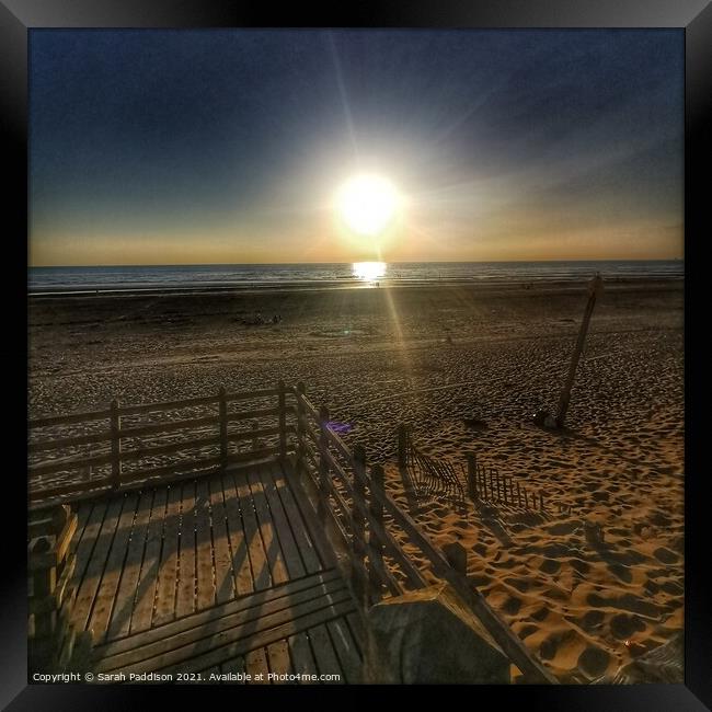 Formby beach as the sun is setting Framed Print by Sarah Paddison