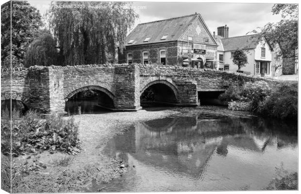 Clun Bridge Shropshire in Black and White Canvas Print by Pearl Bucknall