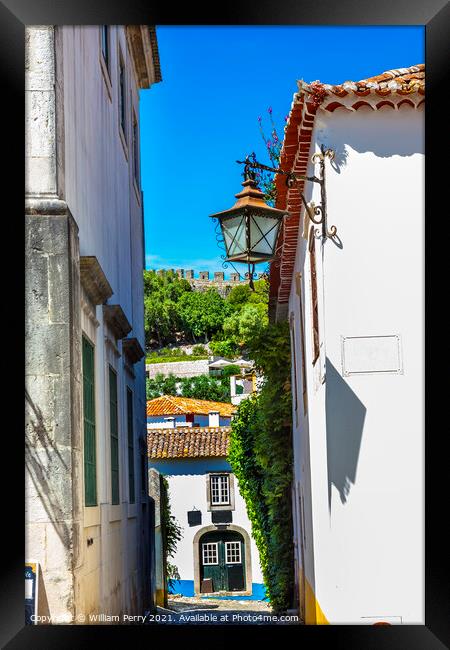 Narrow White Street 11th Century Castle Wall  Obidos Portugal Framed Print by William Perry