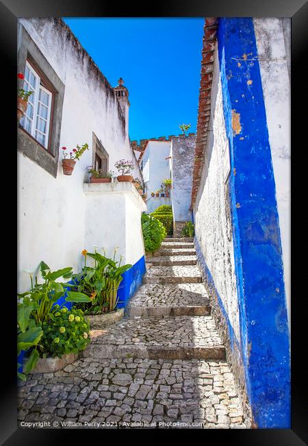 Narrow White Blue Street 11th Century Obidos Portugal Framed Print by William Perry