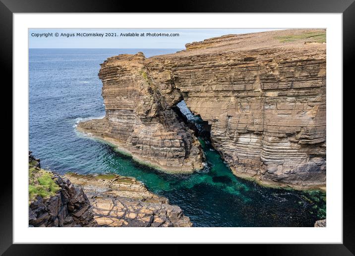 Rock arch near Brough of Bigging, Orkney Mainland Framed Mounted Print by Angus McComiskey