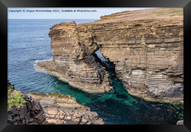 Rock arch near Brough of Bigging, Orkney Mainland Framed Print by Angus McComiskey