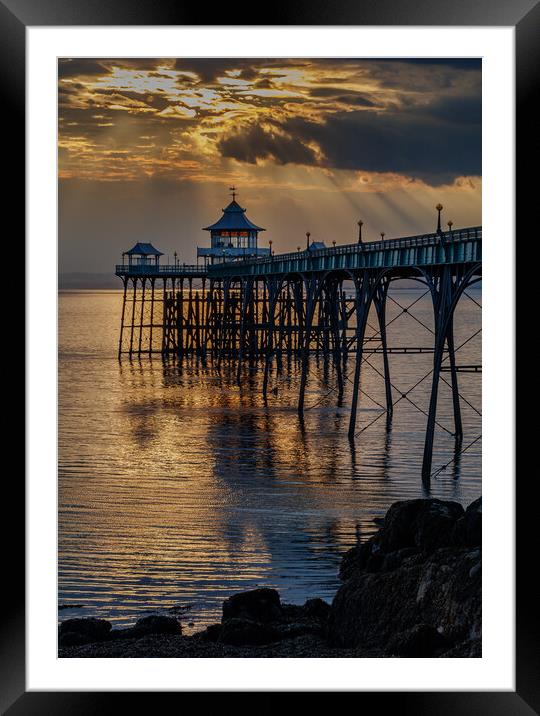 Clevedon Pier at sunset on a calm evening Framed Mounted Print by Rory Hailes