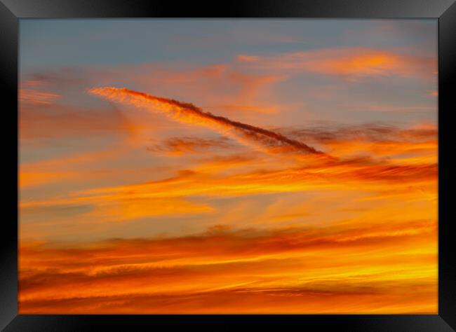Sunset contrail Framed Print by Rory Hailes