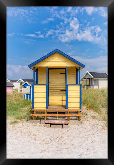 Skanor Beach Hut in Blue and Yellow Framed Print by Antony McAulay