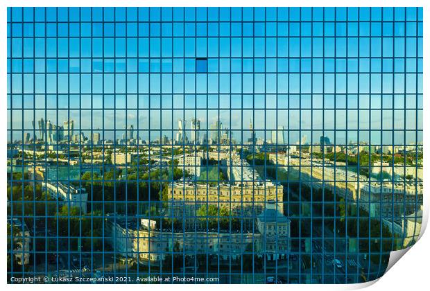 City reflecting in office building Print by Łukasz Szczepański