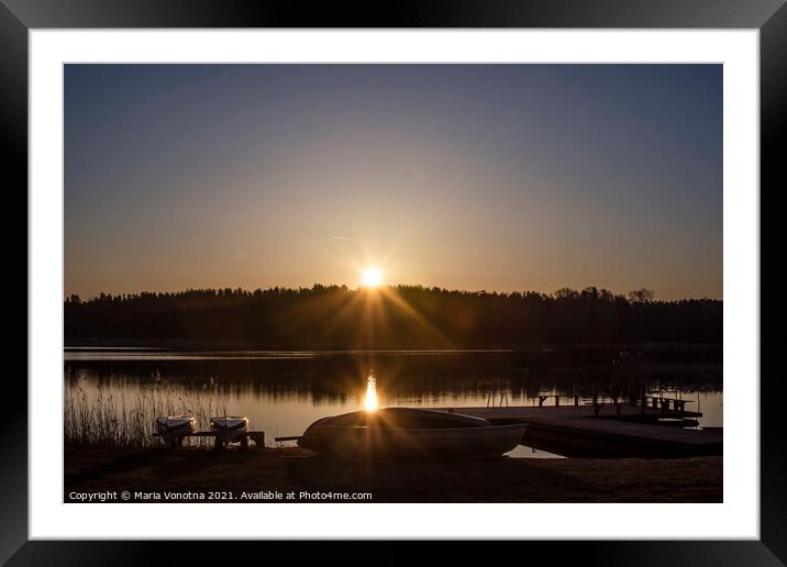 Sunset over lake with boats Framed Mounted Print by Maria Vonotna