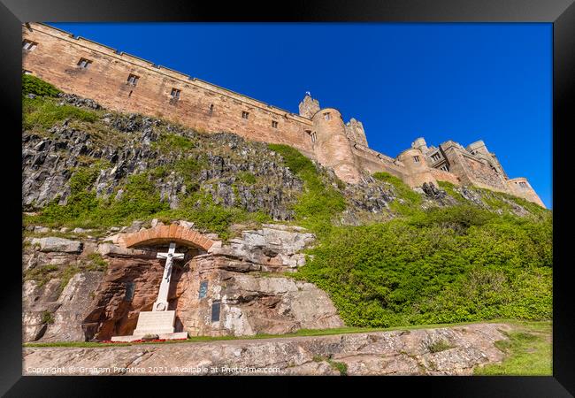 Bamburgh Caste and War Memorial Framed Print by Graham Prentice