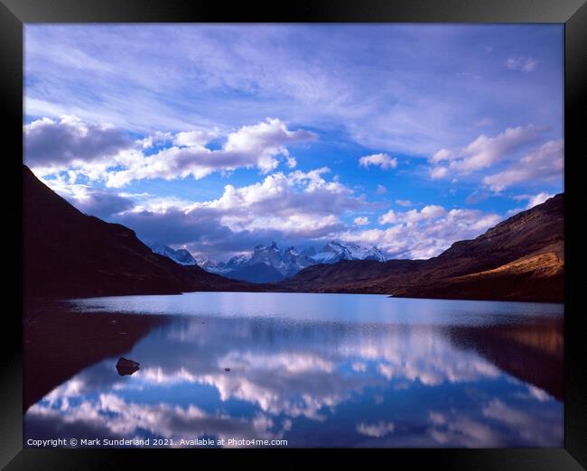 Clouds Reflections in the Rio Paine Framed Print by Mark Sunderland