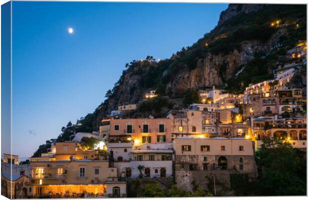 Positano Houses in the Evening Illuminated Canvas Print by Dietmar Rauscher