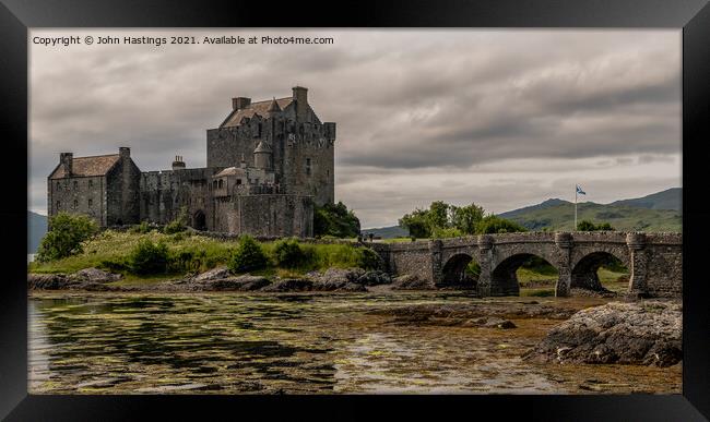 Scottish Fortress on the Highlands Framed Print by John Hastings