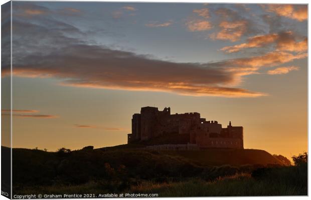 Bamburgh Castle  at Sunset Canvas Print by Graham Prentice