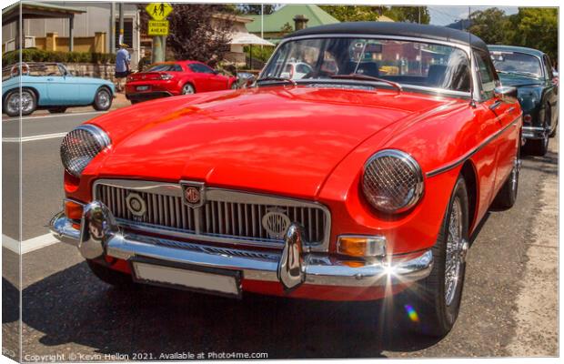 Classic red MGB roadster sports car Canvas Print by Kevin Hellon