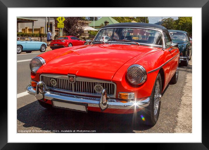 Classic red MGB roadster sports car Framed Mounted Print by Kevin Hellon