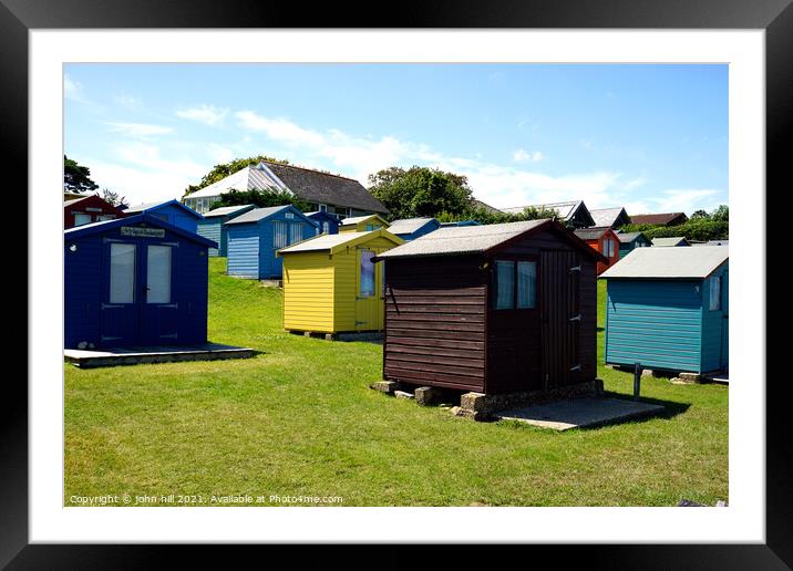 Bembridge beach huts on the isle of Wight. Framed Mounted Print by john hill