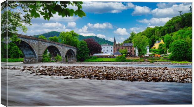 A view of the River Tay and Dunkeld, Perthshire   Canvas Print by Navin Mistry