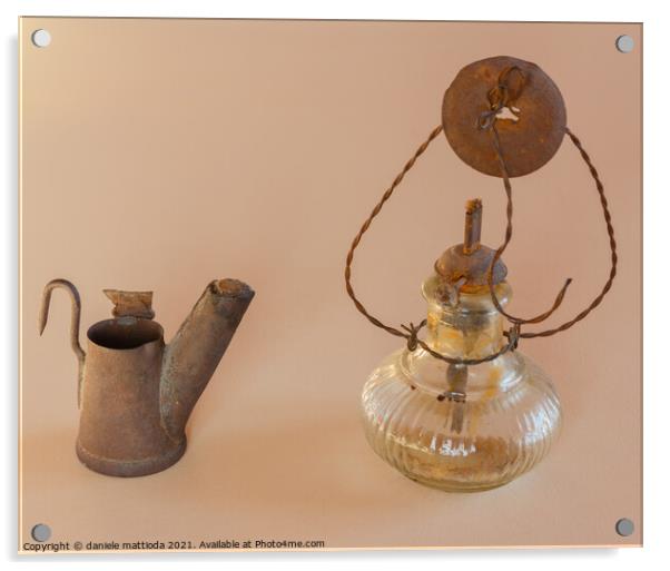 a light and a lamp old Acrylic by daniele mattioda
