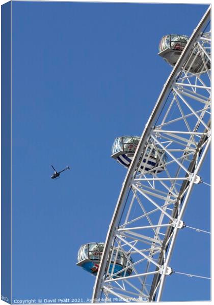 London Eye And Helicopter Canvas Print by David Pyatt