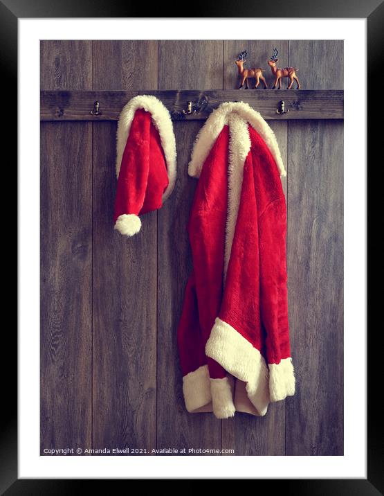 Santa's Hat & Coat Framed Mounted Print by Amanda Elwell