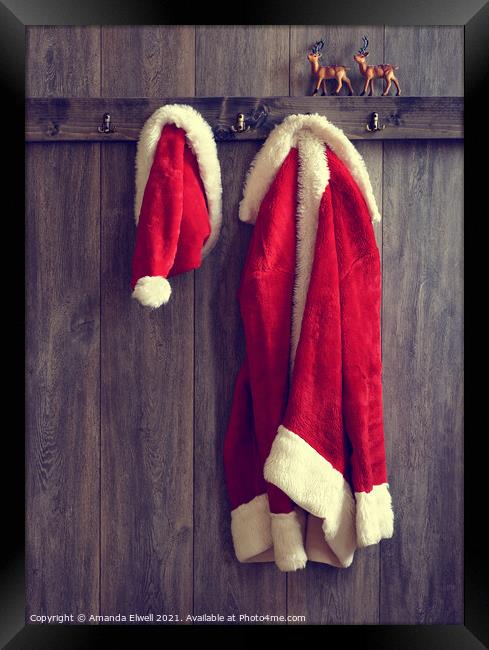 Santa's Hat & Coat Framed Print by Amanda Elwell
