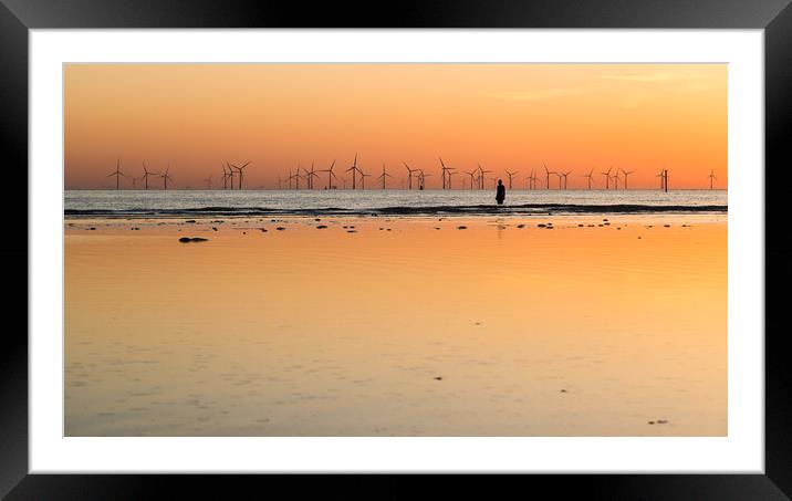 Still waters behind an Iron Man at sunset Framed Mounted Print by Jason Wells